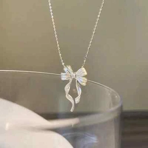 Elegant Silvery Bow Pendant Necklace for Women - Trendy Ribbon Clavicle Chain - Picture 1 of 6