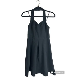 NUEVO CON ETIQUETAS BCBGeneration Negro Sin Mangas Halter Top Acampanado Corto Mini Vestido Talla 0 - Imagen 1 de 9