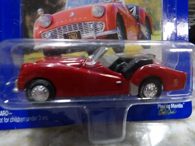 WHITE LIGHTNING 1961 TRIUMPH TR3A   2000 JOHNNY LIGHTNING BRITISH INVASION  1:64 - Image 1 of 4