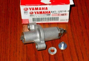 AJUSTADOR TENSOR CADENA LEVA MOTOR YAMAHA RAPTOR 250, XT250 5XT-12210-00-00 - Imagen 1 de 1