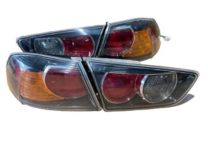 2008-2015 MITSUBISHI LANCER EVOLUTION 10 EVO X OEM TAIL LIGHTS SET OEM. A66 - Picture 1 of 10