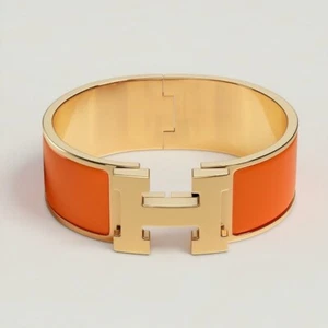 Hermes Clic Clac H bracelet in Orange Fruité, size PM - Picture 1 of 7