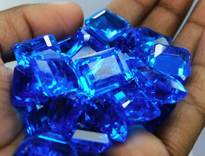 Lab-Created 50 Ct Topaz Emerald Cut Blue CERTIFIED Flawless Loose Gemstones Lot - Image 1 of 4