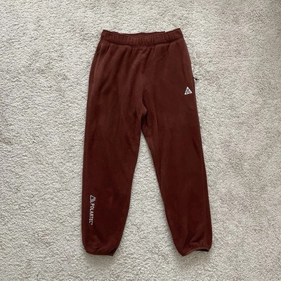 Pantalones polar Nike ACG Polartec Wolf Tree marrón CV0608-217 para mujer talla pequeña” Foto 1 de 4