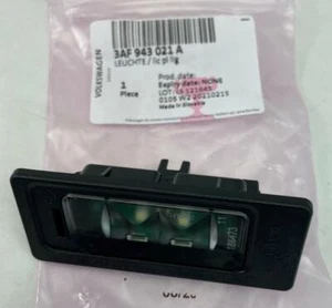 LED LICENSE PLATE LIGHT HOUSING NEW VW VOLKSWAGEN GENUINE 3AF943021A NIP OEM OE - Picture 1 of 2
