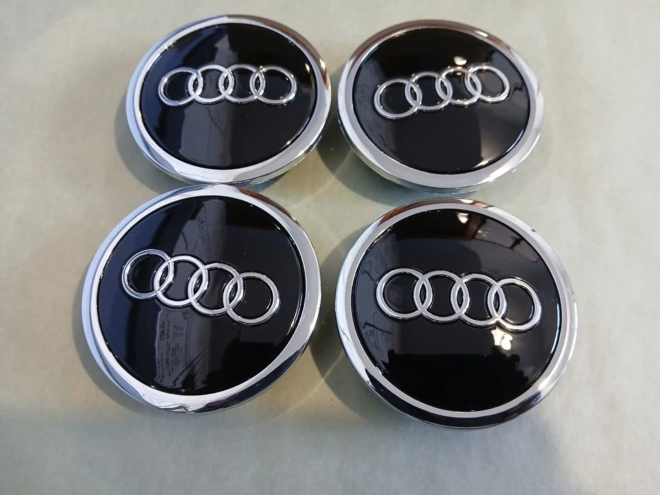 Центральные колпаки ступицы обода колеса Audi 69 мм черные хромированные комплект из 4 шт с эмблемой 4B0601170A - Изображение 1 из 4