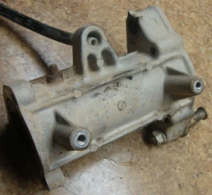 1987 Suzuki LT125 LT 125 Quadrunner Rear Drum Brake Axle Cover Back Carrier 87 - Picture 1 of 1