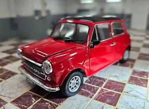 Coche modelo diecast Welly Mini Cooper 1300 1974 rojo escala 1/24 - Imagen 1 de 19