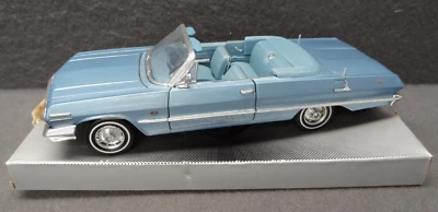 Welly 1:26 1963 Chevrolet Impala Convertible Diecast Car Blue on Blue No. 2434 - Image 1 of 4