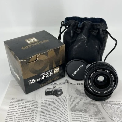 NEW/NOS Olympus ZUIKO AUTO-W 35mm F2.8 OM Lens w/Box Paperwork & Accessories - Image 1 of 4