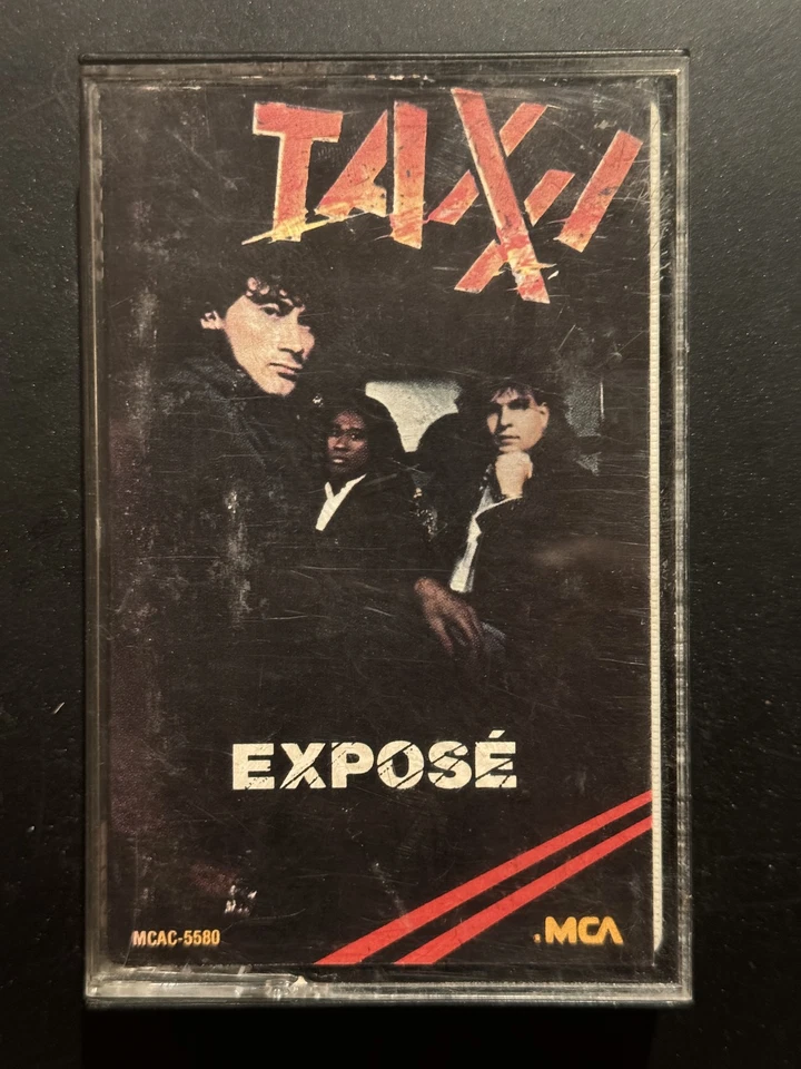 Taxxi - Expose Cass, Album MCA Records 1985 Rock, Pop MCAC-5580 - Imagem 1 de 1
