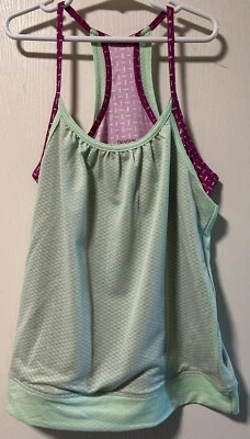 CAMISA DEPORTIVA SIN MANGAS DANSKIN NOW NIÑAS TALLA L 10-12 Foto 1 de 4