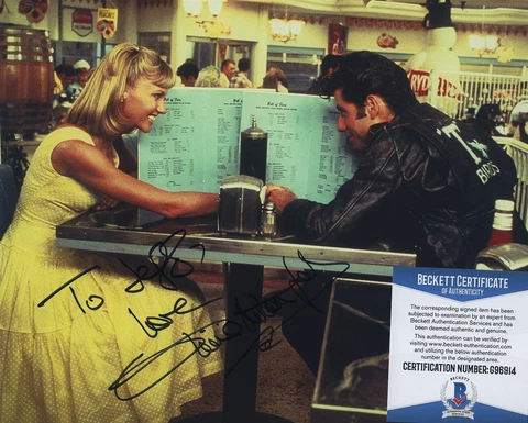 OLIVIA NEWTON-JOHN SIGNED AUTOGRAPHED COLOR GREASE PHOTO TO JEFF BAS BECKETT COA Cover