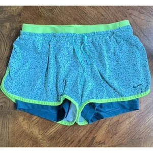 Nike Dri Fit pantaloncino da corsa donna 2 in 1 blu e verde lime splatter taglia M - Foto 1 di 7