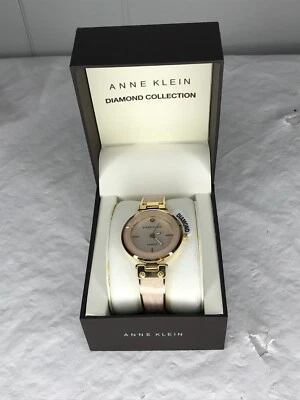 Reloj pulsera Anne Klein para mujer con detalles de diamantes tono dorado rosa claro 34 mm nuevo en caja Foto 1 de 4
