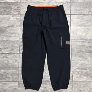 Nike Sport Utility Woven Cargo Hose Damen Größe L Schwarz Tapered DX2322-01 Neu mit Etikett - Bild 1 von 5