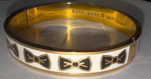 Bracciale Kate Spade New York "Tie One On" fiocchi cerniera nero con tono oro