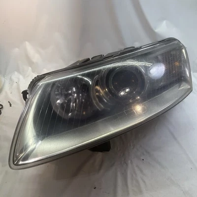 奥迪 A6 2005 - 2008 车头灯驱动侧左氙气高强度高强度自适应曲线 Opt 原始设备制造商 — 第 1/4 张图片