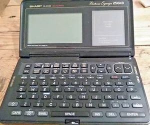 Sharp IQ-8500M Electronic Organizer inkl. RAMCARD IQ-783, Pegelkonverter CE-133T - Bild 1 von 6