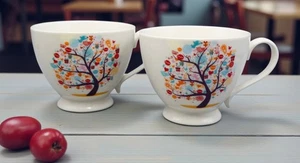 Juego de 2 tazas de cerámica Sabichi - Diseño de árbol colorido - Muy buen estado - Imagen 1 de 8