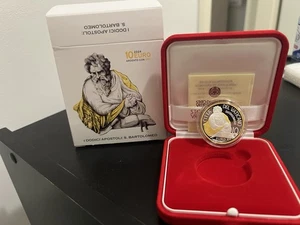 VATICANO 2024 MONETA 10 EURO ARGENTO + RILIEVI IN ORO "SAN BARTOLOMEO" SOLO 1500 - Foto 1 di 5