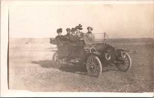 Family Out for a Ride in Old Car RPPC - Picture 1 of 2