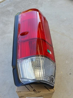 Toyota VDJ76 VDJ78 Land Cruiser LH tail light assembly NEW 81561-60710 - Image 1 of 3