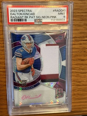 Dalton Kincaid 2023 Panini Spectra Neon Pink Rookie Patch Auto /25 RPA PSA 9 - Image 1 of 3