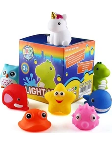 Juguetes de baño 8 piezas iluminados flotantes de goma para animales conjunto color intermitente NUEVO - Imagen 1 de 9