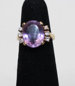 10K Ring, Yellow Gold with Purple Stone and with/6 2 Point Diamonds - Picture 1 of 4