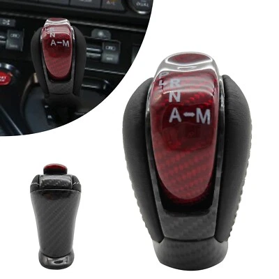 Perilla de cambio de línea roja de fibra de carbono y cuero negro y blanca para Nissan GTR R35 2008-22 Foto 1 de 4