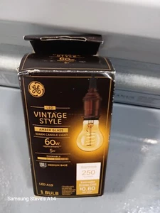 GE LED VINTAGE STYLE AMBER GLASS 60W WARM CANDLE LIGHT - Picture 1 of 3