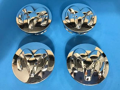 JUEGO TAPAS CENTRALES DODGE RAM DURANGO DAKOTA CROMO GENUINO DE FÁBRICA FABRICANTE ORIGINAL 1LB72TRMAB  Foto 1 de 4