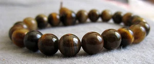 Buddha-Armband aus Tigerauge braun 15 bis 20 cm / Südafrika - Power-Beads. - Bild 1 von 1