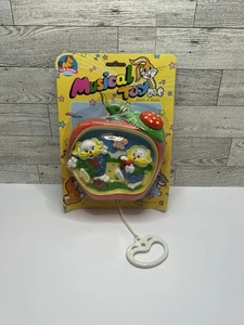 De colección Tin Kong Manzana Conejo Juguete Musical Tirar Cordón Caja de Música Lindos Animales Kitsc - Imagen 1 de 6
