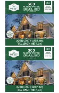 Lot of 2 - Holiday Time 300 LED Warm White Icicle Christmas Lights - White Wire - Picture 1 of 4