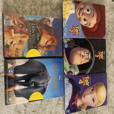 Toy Story 2,3 And 4 With Free Lion King And Dumbo DVDs All New And Sealed - Image 1 of 4