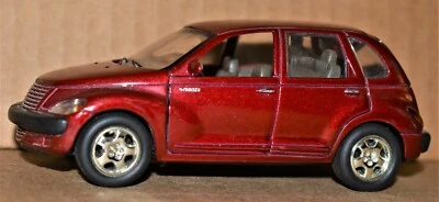Daimler Chrysler 2000 PT Cruiser Motorized Burgundy Boley Corp. 1/32, Preowned - Image 1 of 4