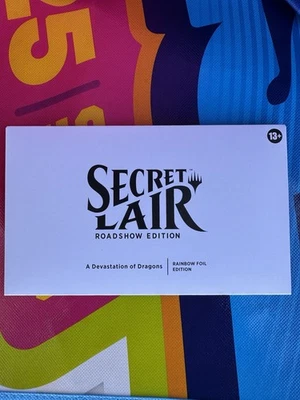SDCC 2025 HASBRO SECRET LAIR ROADSHOW EDITION DEVASTATION DRAGONS RAINBOW FOIL - Image 1 of 2