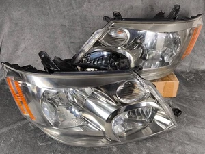 JDM Toyota Alphard MNH10 ANH10 2003-2005 HID faros luces lámparas 1 par OEM - Imagen 1 de 24
