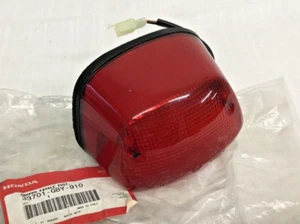 Honda Sh 50 Fifty TAIL LIGHT 33701-GBY-910 TAILLIGHT NOS ORIGINAL - Picture 1 of 5