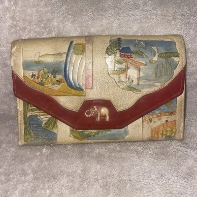 Monedero clutch japonés de cuero mecanizado a mano de los años 20 muy antiguo con elefante celuloide Foto 1 de 4