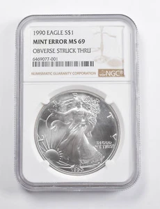 Mint Error MS69 1990 American Silver Eagle OBV Struck Thru NGC *3458 - Picture 1 of 3