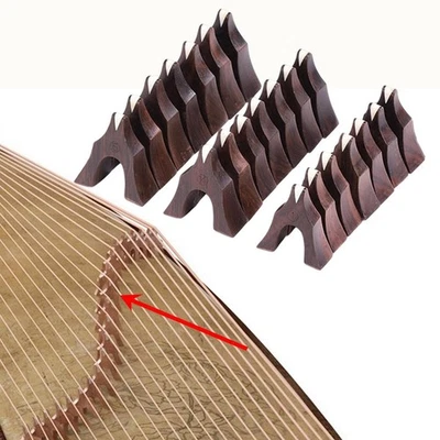 21x supporti per corde per ponti Guzheng, accessori per l'installazione di - Immagine 1 di 4