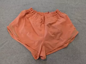Lululemon Tracker Short Damen 10 orange gefüttert Mid-Rise Reißverschlusstaschen Athleisure - Bild 1 von 14