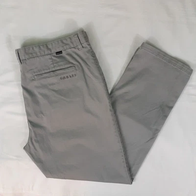 Pantalones chinos Oakley para hombre 40x30 gris calce personalizado caqui frente plano elástico Foto 1 de 4