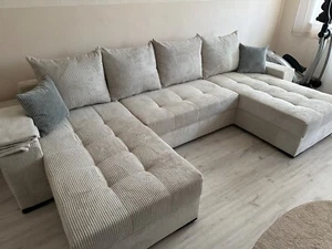 Couch mit Schlaffunktion und Bettkasten in Beige - Bild 1 von 2