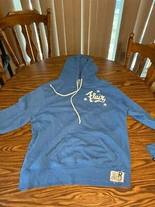 SUDADERA CON CAPUCHA RIC FLAIR RAÍCES DE LA LUCHA AZUL CON CORDÓN TALLA 3XL J2 - Imagen 1 de 6