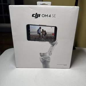 Stabilizzatore pieghevole DJI OM 4 SE grigio nuovo sigillato in plastica spedizione gratuita - Foto 1 di 6