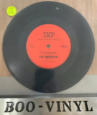 The Imposter  ‎– Pills And Soap (Elvis Costello)  7"  Vinyl  45rpm Ex+ Con - Image 1 of 3